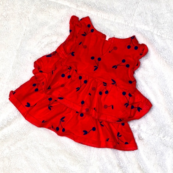 Fusia ruffled top with cherries. Size 9 Month. Brand: Carters. Good condition. - Picture 2 of 2